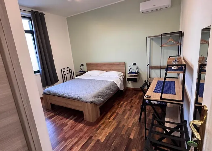 Alojamento de Acomodação e Pequeno-almoço Dormire A Reggio Zona Aeroporto 3*